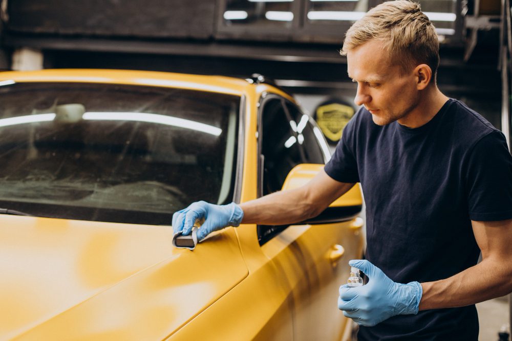 man-car-service-doing-car-ceramic-procedure